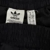 adidas Originals Baggy Trainingshose – Schwarz / Weiß – Trefoil – Größe S