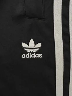 adidas Originals Baggy Trainingshose – Schwarz / Weiß – Trefoil – Größe S