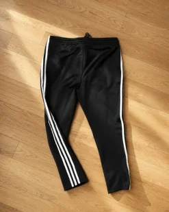 adidas Originals Firebird Trainingshose – Schwarz / Weiß – Trefoil – Größe M