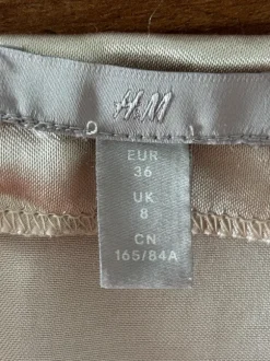 Beigefarbenes Trägerkleid mit Schleife – Gr. 36