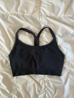 dark blue sports bra thick straps structured pretty back removable pads