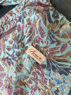 For men: beach shirt and shorts with bag included