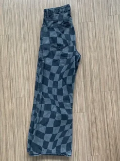 Loose bootcut Hose mit Muster