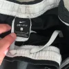 Nike Dri-FIT Trackpants – Schwarz/Weiß – Größe S