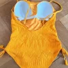 Piha Badeanzug / Body in Orange mit Strukturmuster – Gr. 38/M