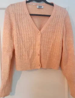 Rosa Strickjacke