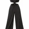 Schwarzer Glitzer-Jumpsuit mit Cut-out an der Taille