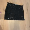 Schwarzer Pailettenrock Divided H&M Größe 36