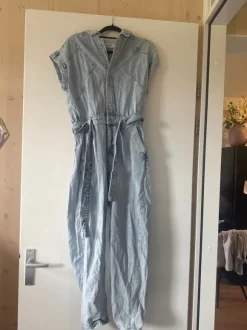 Spijker jumpsuit maat M