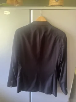 Zwarte blazer nooit gedragen met prijskaartje